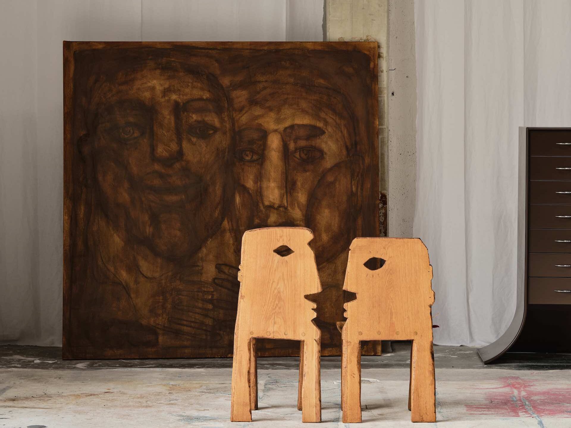 besos chairs and large painting by timothy van oorschot